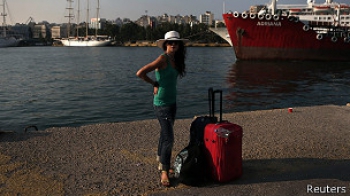 туристка с чемоданом